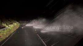 Powerful waves slam seaside road amid Storm Amy in Armadale, Scotland