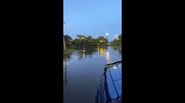 Roads submerged by king tide flooding along the river in Daytona Beach, USA