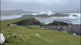 Strong winds and crashing waves along Atlantic Drive in Achill Island, County Mayo, Ireland