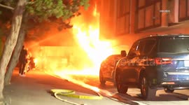 US, Los Angeles: Canoga Park Firefighters Tackle Garage Blaze in Condominium