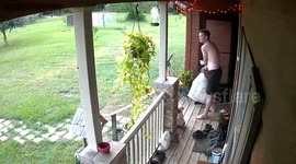 Man loses balance and falls on stairs while carrying trash in Livingston, Texas, USA