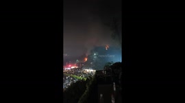 Hillside fire erupts during drone fireworks show in Liuyang, Hunan, China