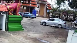 Driver rams into Buddhist temple wall during funeral