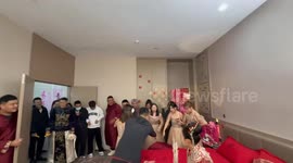 Bridesmaid accidentally hits wrong man during wedding door game in Liaoning, China