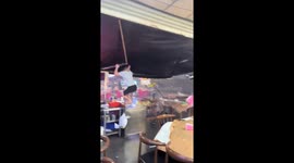 Typhoon Matmo batters the outdoor restaurant in China