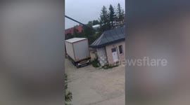 CCTV shows truck ramming building causing severe structural damage