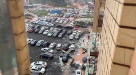 Strong winds from Typhoon Matmo send debris flying in Guangdong, China