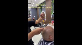 Man with ONE strand of hair pays to get a trim, wash, and blow dry