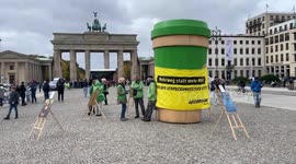 Germany: Greenpeace activists stage environmental protest at Brandenburg Gate in Berlin