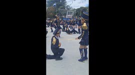 Respectful Boy Covers Face During Dance Routine