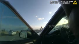 US: Hero South Florida Cop Saves Woman From Jumping Off Bridge