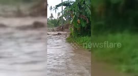 Philippines: Man Rescued After Clinging to Tree Branches During Philippine Floods