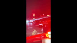 Driver drops phone while trying to ask for a number in Tempe, Arizona, USA