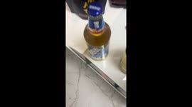 Man opens beer bottles in an unusual way in Henan, China