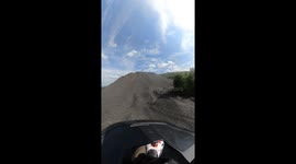 Dirt Biker Runs Out of Hill