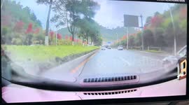 Speeding car loses control and crashes into central divider in Jiangsu, China