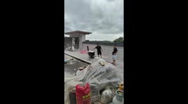 Pot catches fire while cooking outside in Guangxi, China