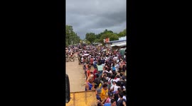 Hundreds of residents stranded on muddy flooded road in the Philippines