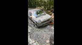 Car Pulled Out Of Deep Mud