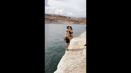 Duo's Clingy Flip Off Lake Powell Cliff