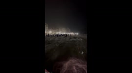 Sudden Surge of Wind Takes Beachgoers by Surprise