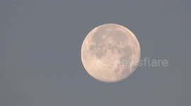 Full moon appeared on the skyline of St Petersburg, Russia