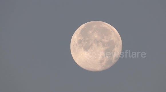 Full moon appeared on the skyline of St Petersburg, Russia