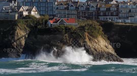 Towan Island home pounded by winter waves, Newquay, Cornwall, UK