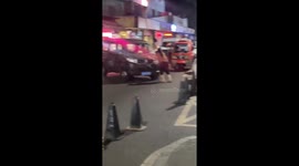 Dog helps owner push vehicle into parking spot in Chongqing, China