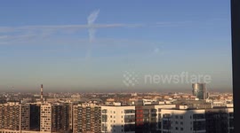 Harvest Moon glows faintly over St Petersburg, Russia