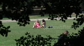 Londoners enjoy Green Park during hottest day of the year so far