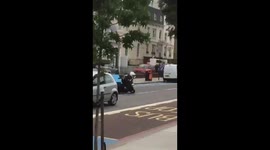 Domino's delivery driver topples off moped while performing wheelie