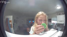 Girl Sneaks a Cookie Without Mom’s Permission