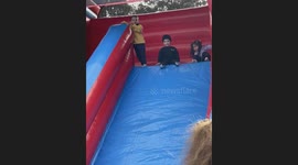 Boy's Kind Hand Makes Slide Less Scary