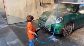 Kid Hoses Dad in the Face at Car Wash