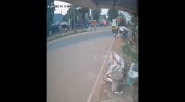 Biker Loses Control, Slips Under Cement Truck on Andhra Pradesh Highway — Miraculously Survives