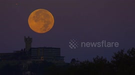Stunning footage of supermoon setting behind mountain in San Sebastian