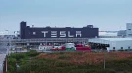 UNCAPTIONED: Tesla Launches Cheaper Model 3 and Model Y Versions Amid Competitive EV Market
