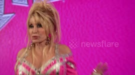 UNCAPTIONED: Dolly Parton dispels health fears: 'I ain't dead yet!'