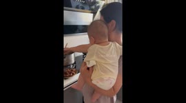 Baby adorably drools over hot pot food in Liaoning, China