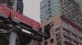 trains entering and exiting a building at liziba station in chongqing, china