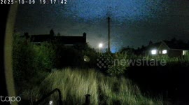 Dazzling power surge lights up the night sky above a quiet village in Staffordshire UK