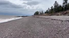 Stormy high-tide waves at Keating Sand Beach, Nova Scotia, Canada