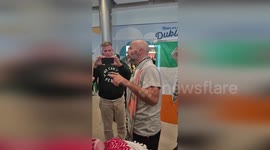 Irish comedian Tadhg Hickey greeted by Palestine supporters as he returns from Gaza stunt