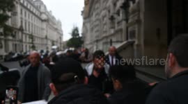 Adam Sandler signs for fans after leaving hotel for London Film Festival