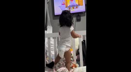 Adorable toddler dances to TV show in Boa Vista, Brazil