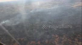 Firefighting teams are working at the IF Almorox wildfire in Toledo after the fire reignited overnight