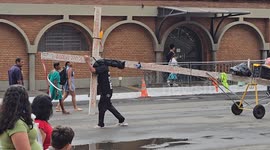 Brazil: Pilgrim carries a giant cross