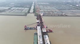 China: World's largest-span self-anchored suspension bridge to enter steel structure installation phase