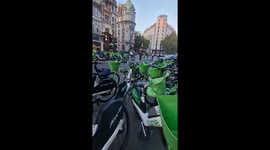 Hundreds of Lime bikes clutter up pavement in the Strand, London